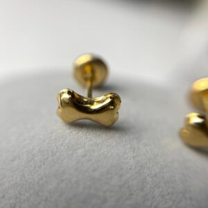 TOPO HUESO ORO